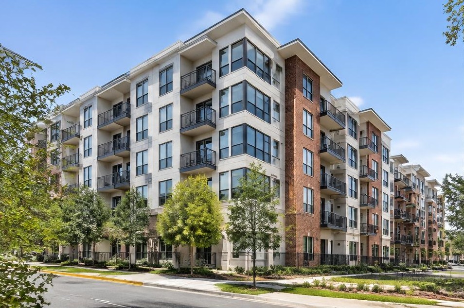 Illustrative Class A contemporary brick and white apartment mid-rise with balconies